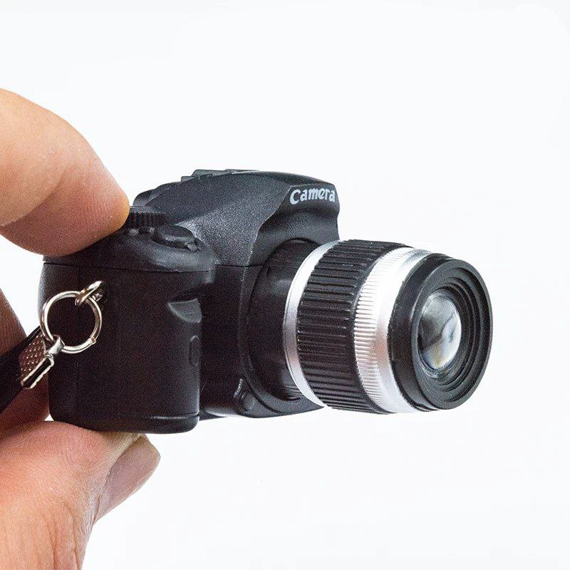 ميدالية على شكل كاميرا ميني تصدر صوت وفلاش للمفاتيح