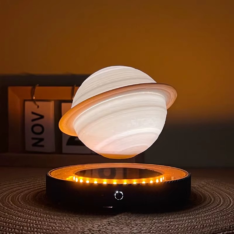 اباجورة مكتب ثري دي بتصميم كوكب زحل العائم بقاعدة شفافة تدور 360 درجة