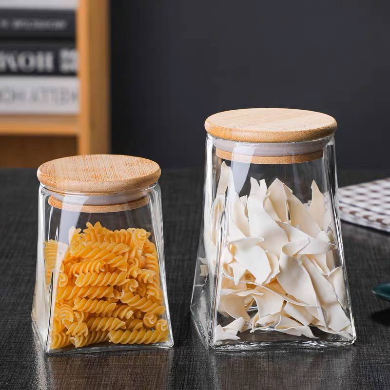 طقم برطمانات زجاج قطعتين لحفظ وتنظيم الشاي والسكر والقهوة مقاسات مختلفه غطاء خشب محكم الغلق